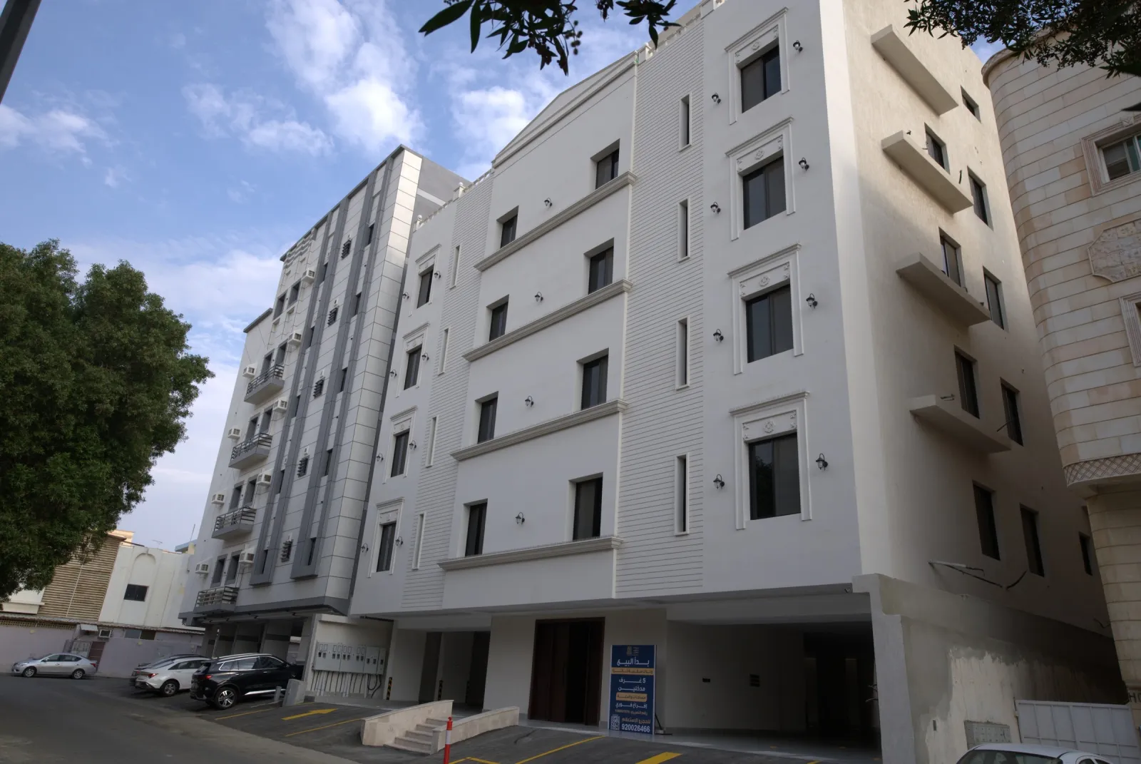 Site photograph: the completed building and its entrance